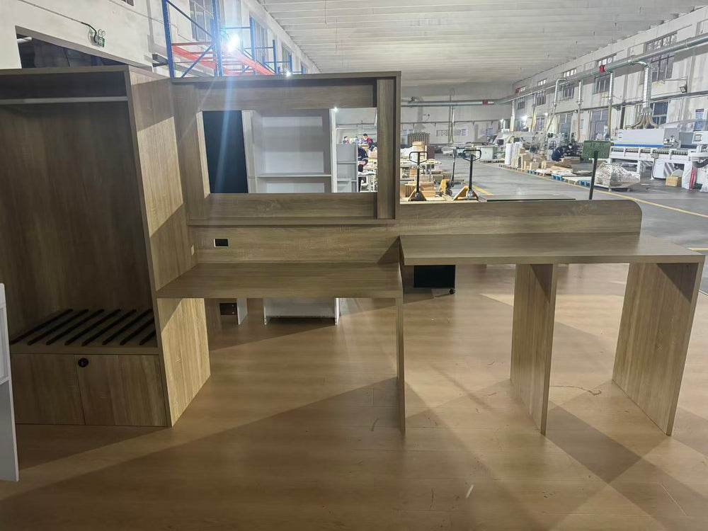 Custom wardrobe, desk and TV joinery assembled for a modular accommodation project